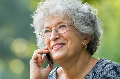 a woman holding a phone