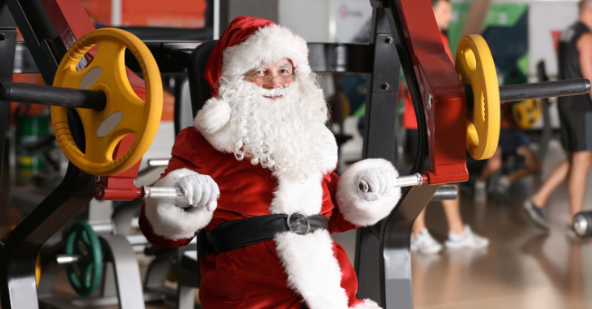 A photo of Santa lifting weights